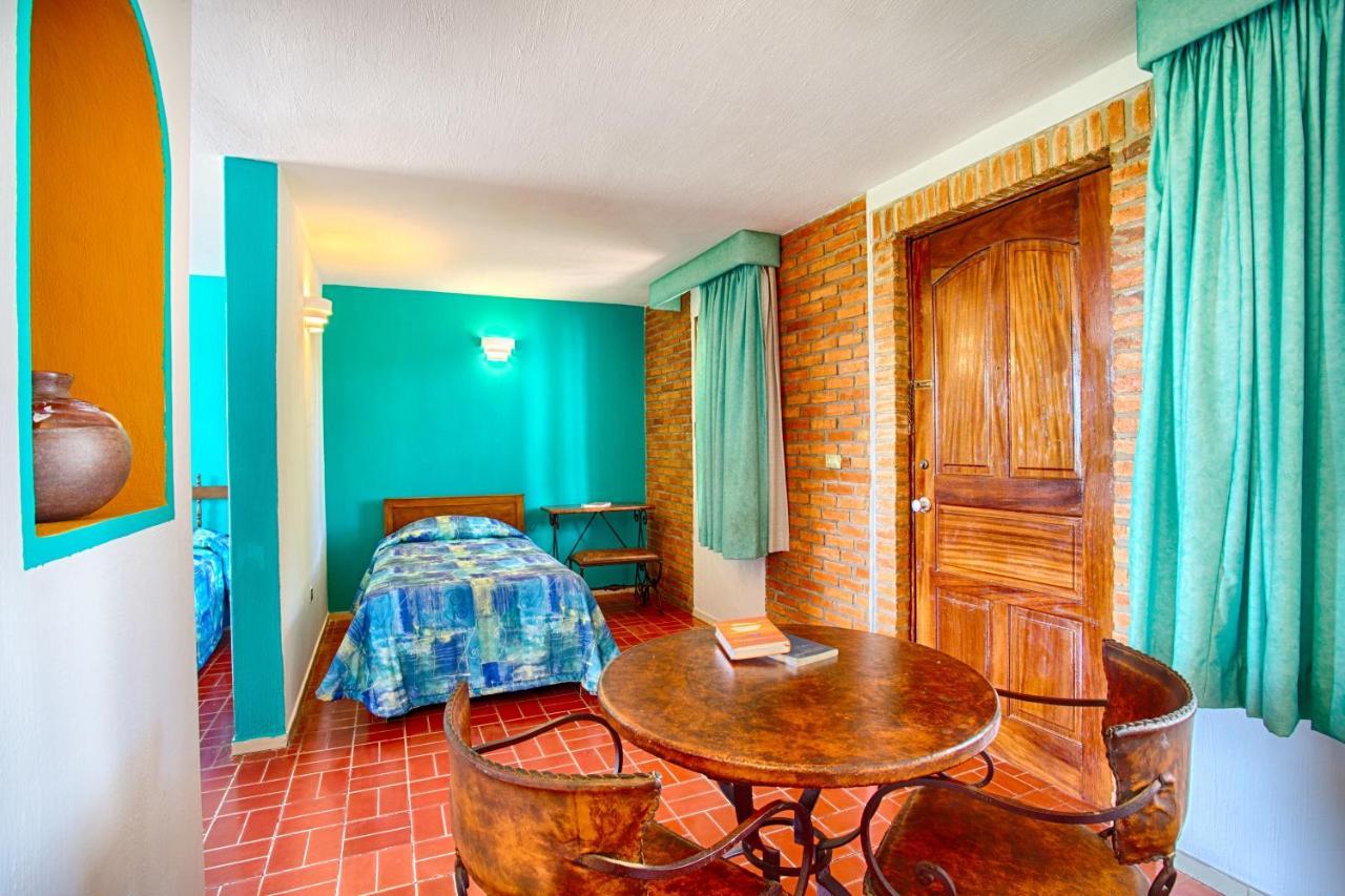 Standard Double Room Two Double Beds One Single Bed