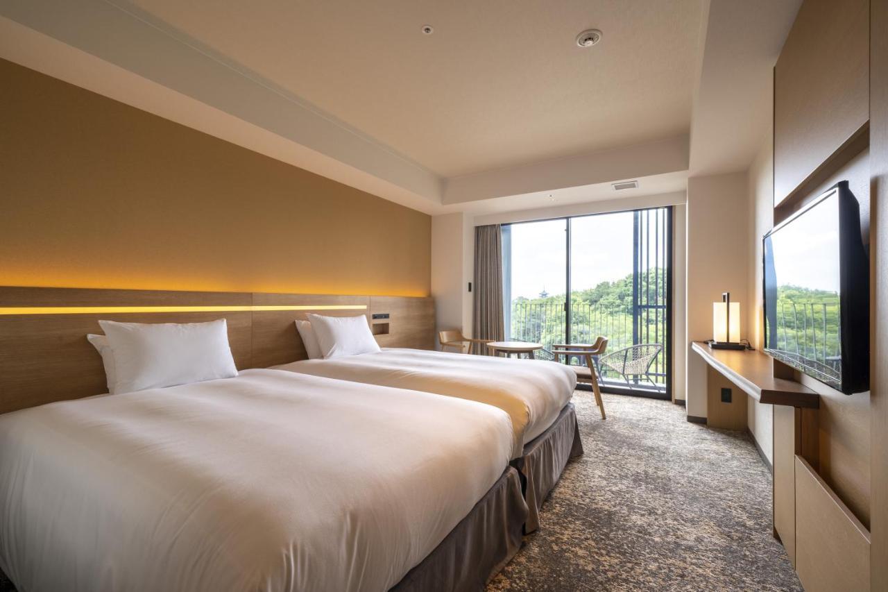 Twin Room with Bathroom, Balcony and Garden View - Non Smoking