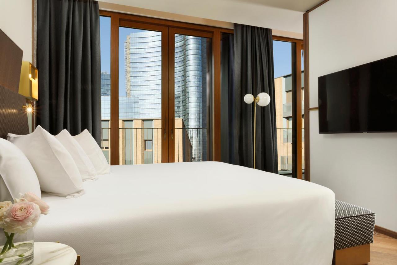 Junior Suite Kamer met Extra Bed - Uitzicht op de Stad