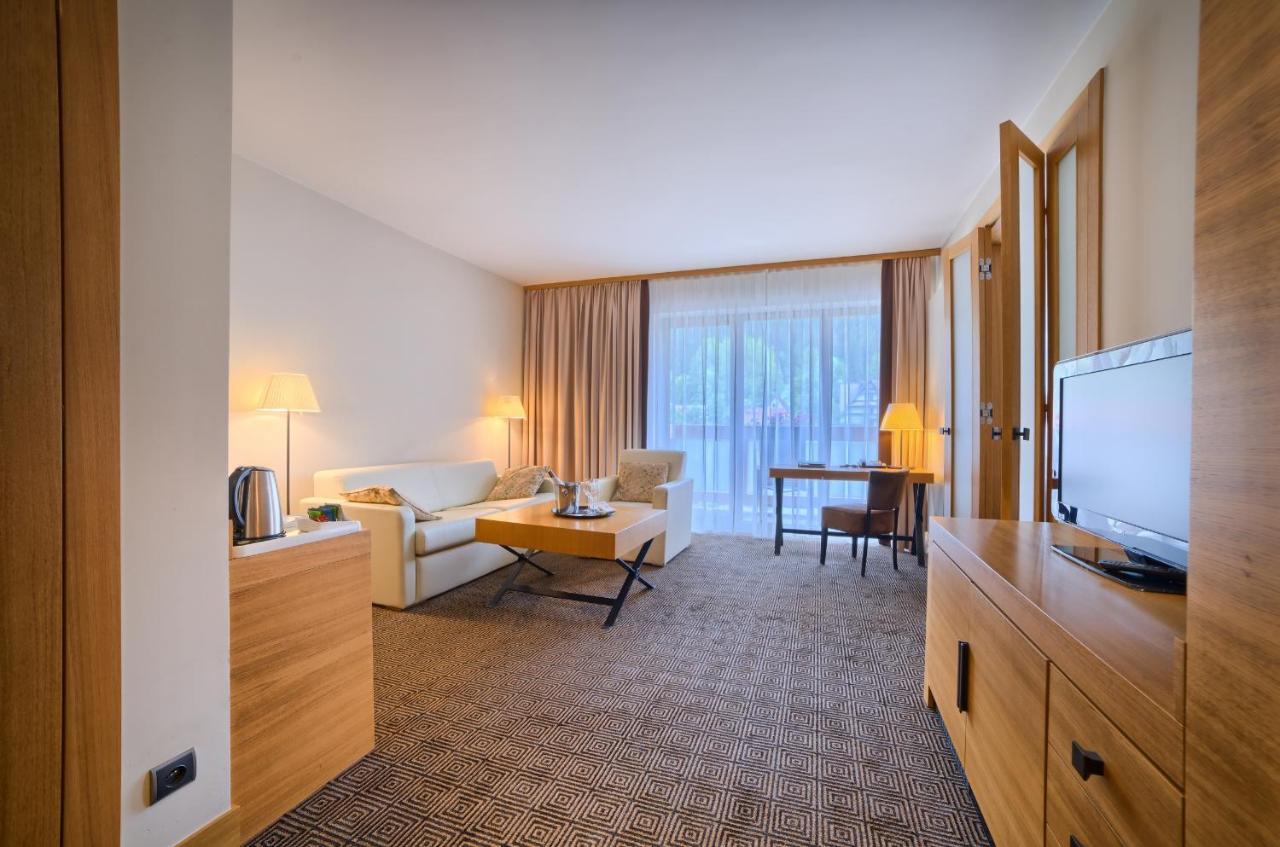 Suite met 1 Slaapkamer, een Queensize Bed en een Slaapbank