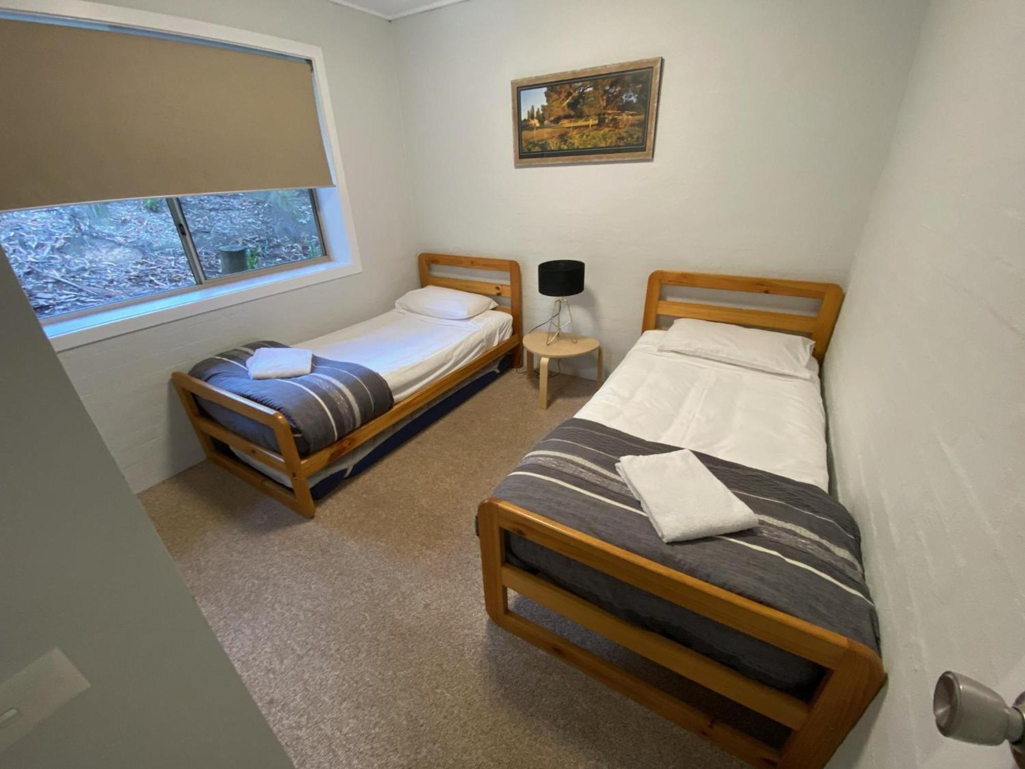 Superior Cottage with One Queen Bed and Two Single Beds (4 Guests)