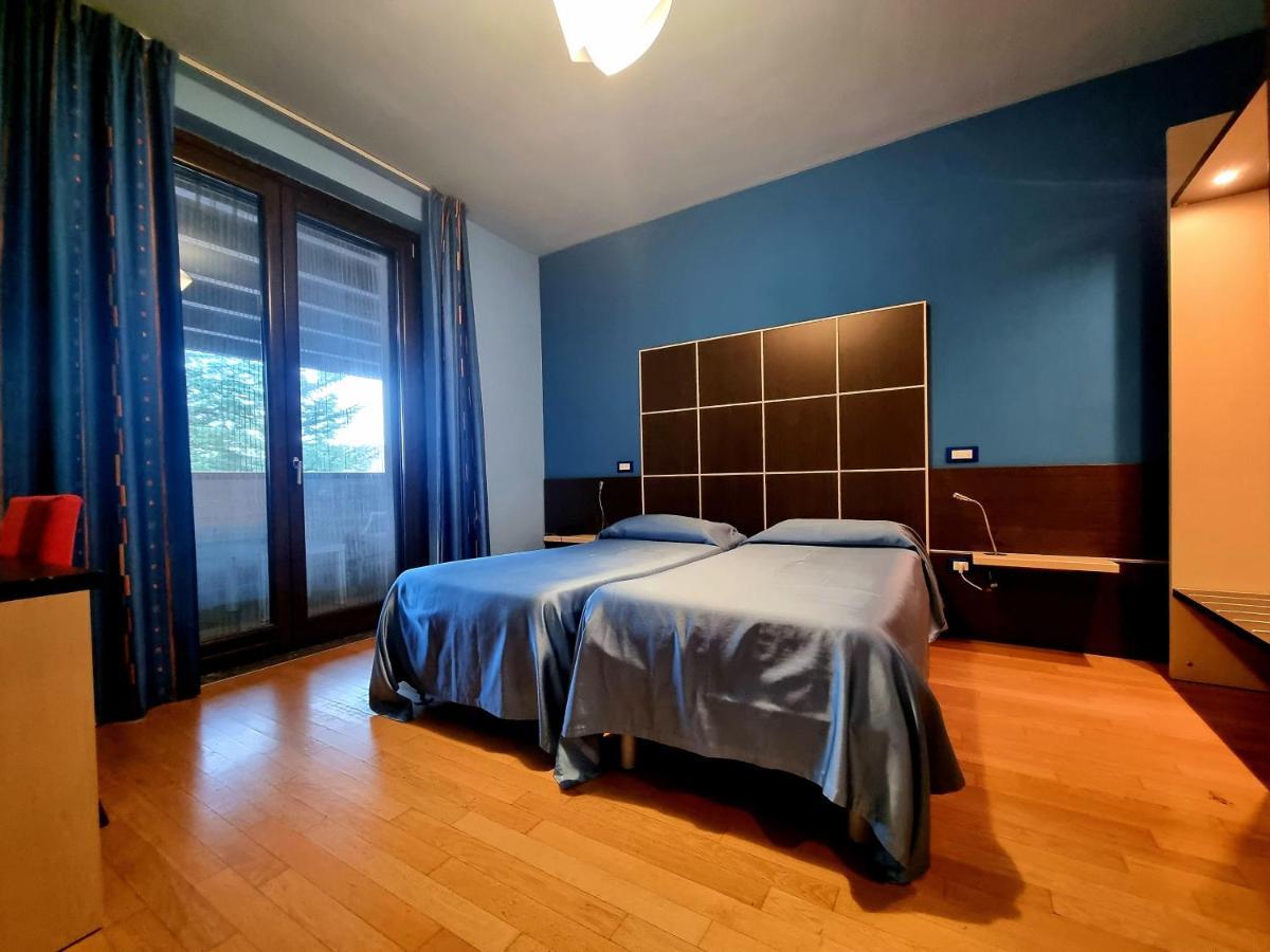 Camera Matrimoniale/Doppia con Letti Singoli con Balcone