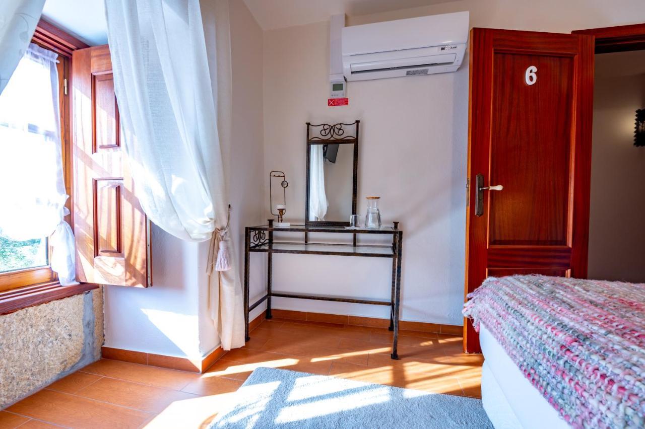 Quarto Duplo com Vista Piscina