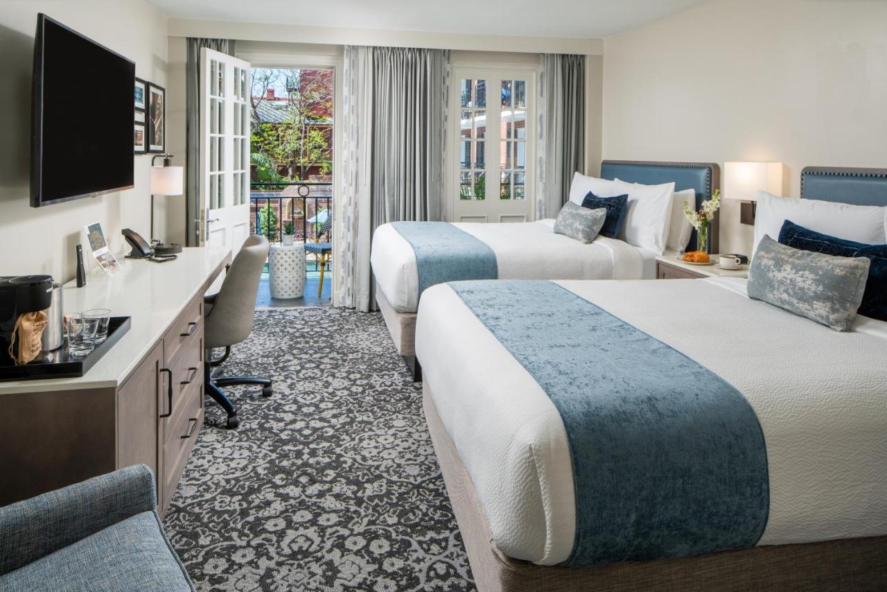 Deluxe Kamer met 2 Tweepersoonsbedden en Balkon - Uitzicht op de Binnenplaats