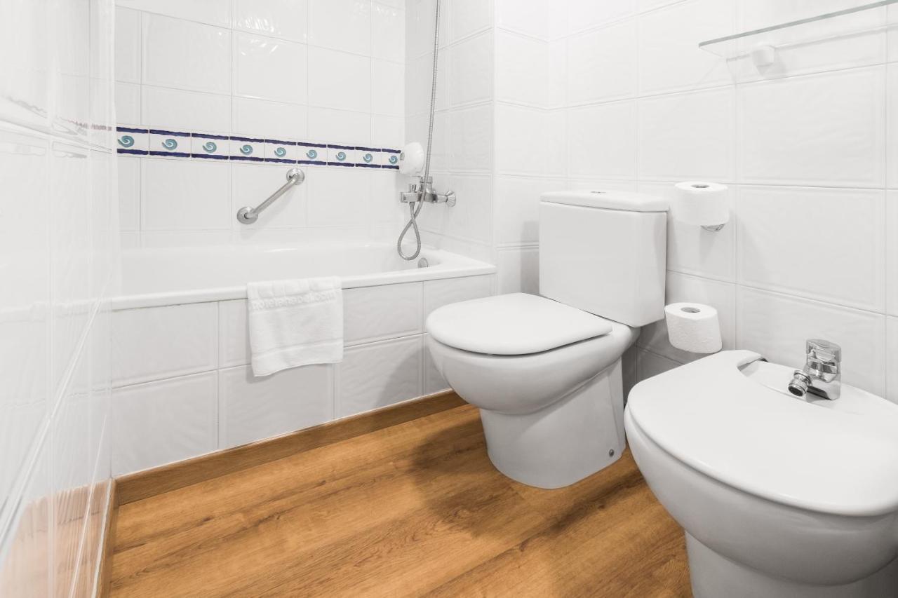 Chambre Triple - Vue sur la Piscine
