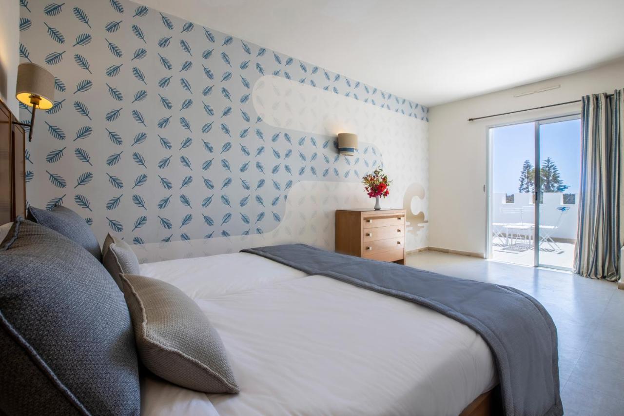 Quarto Triplo com Vista Mar