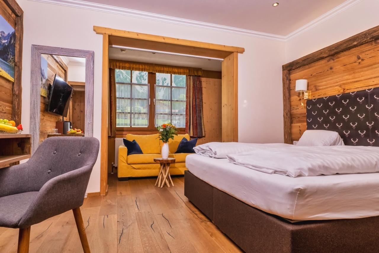 Doppelzimmer mit Balkon (2 Erwachsene + 1 Kind)