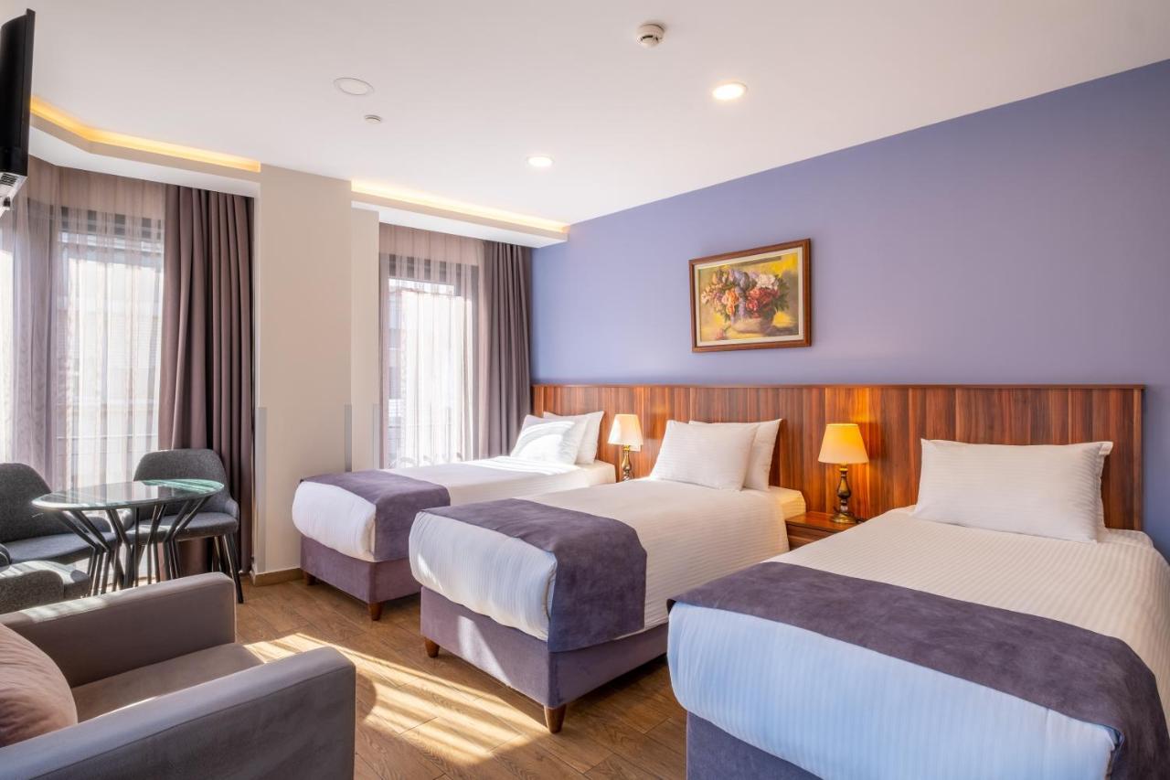 Eckdreibettzimmer