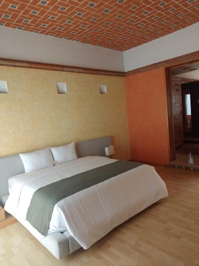 Suite con cama extragrande