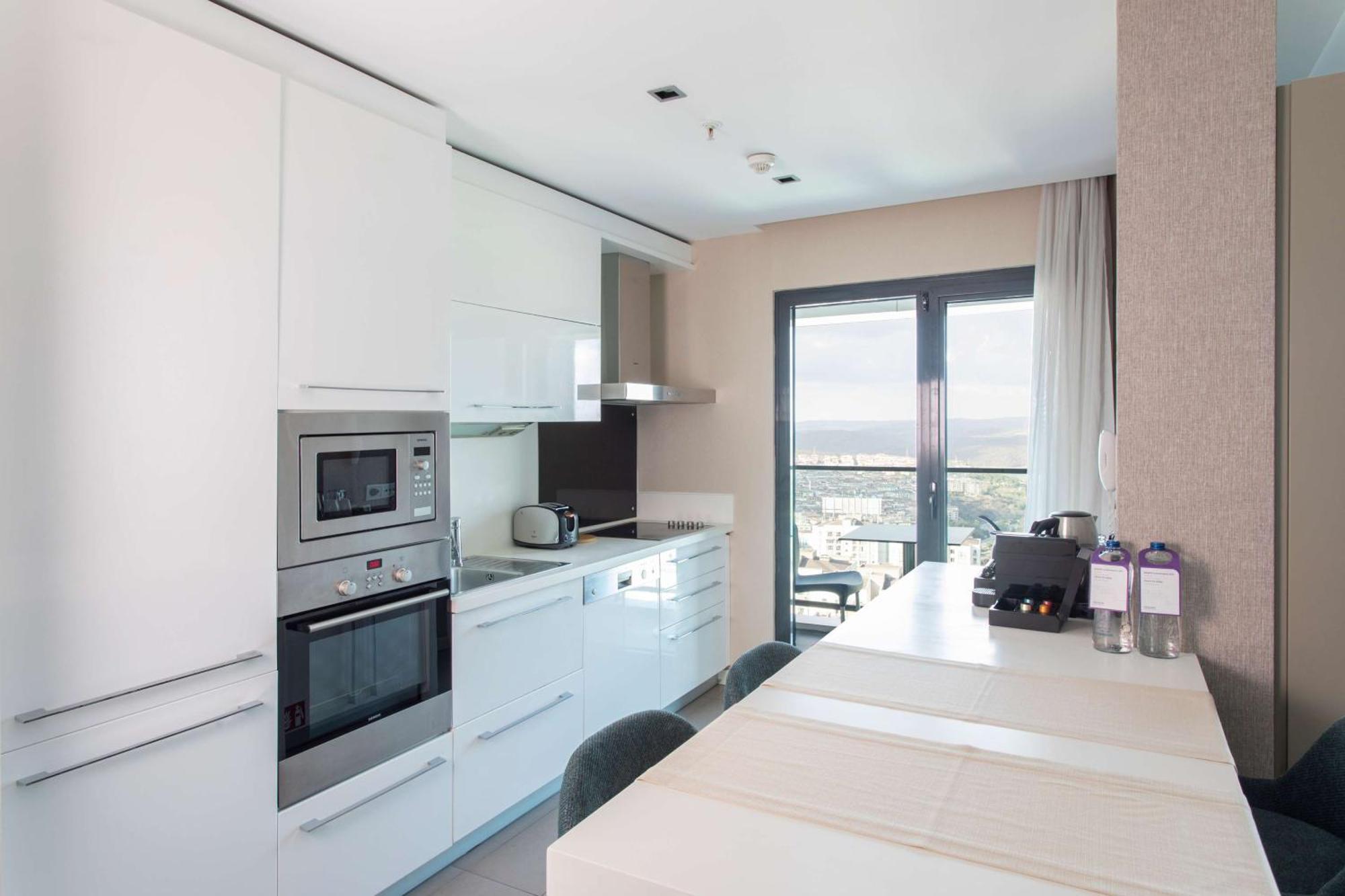 One-Bedroom Apartment with Balcony and View
