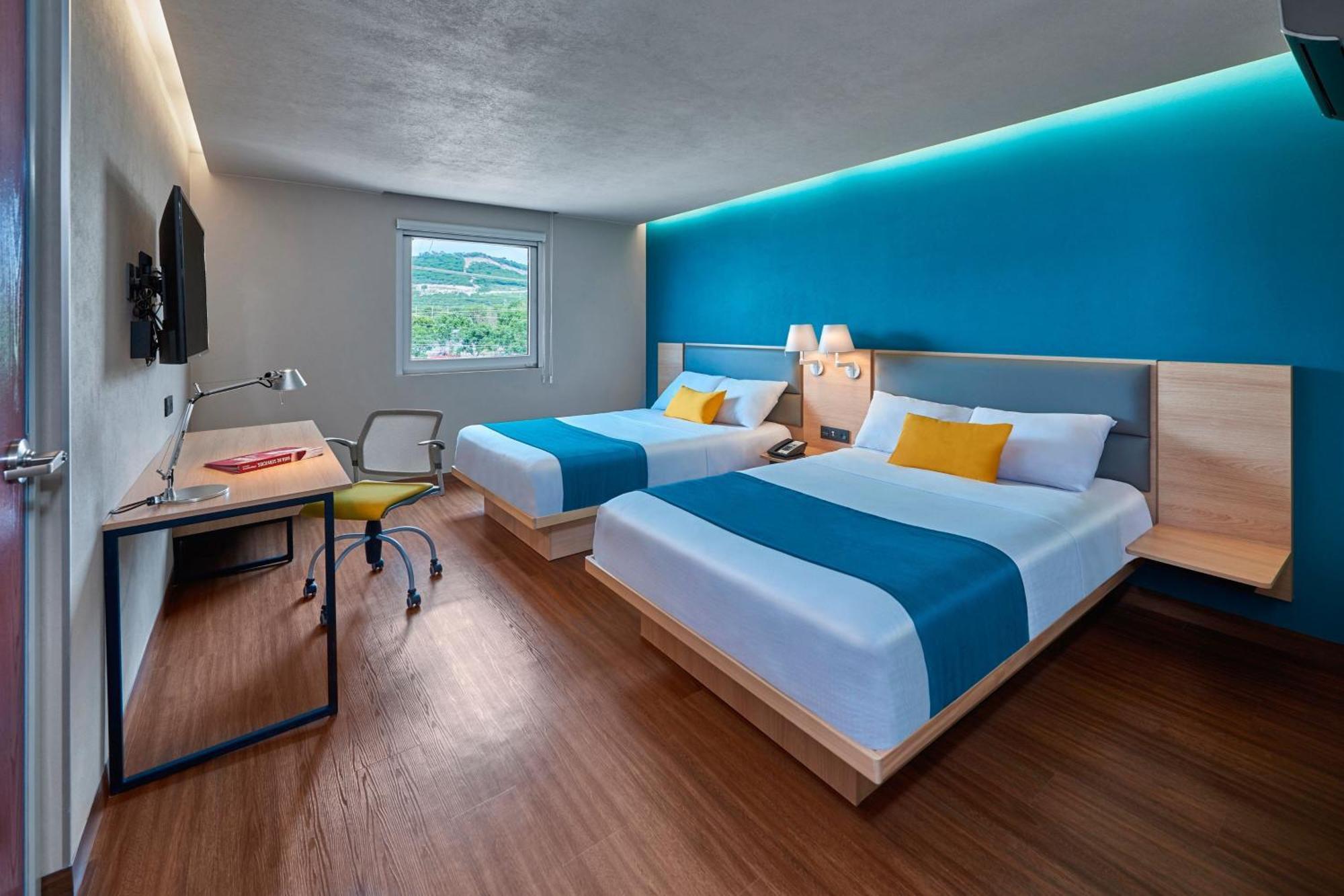 Suite Doble - 2 camas dobles y 1 sofá cama