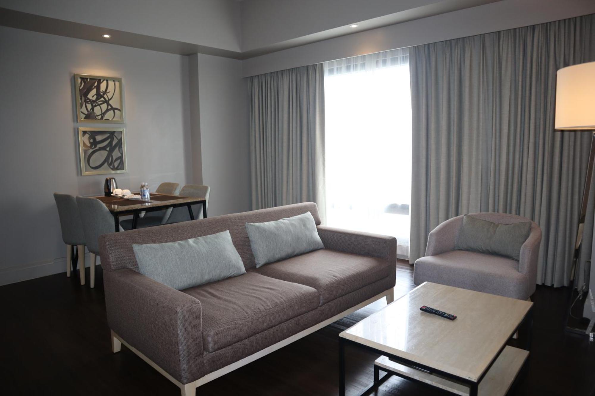 1 King Bed One-Bedroom Kitchenette Living Area