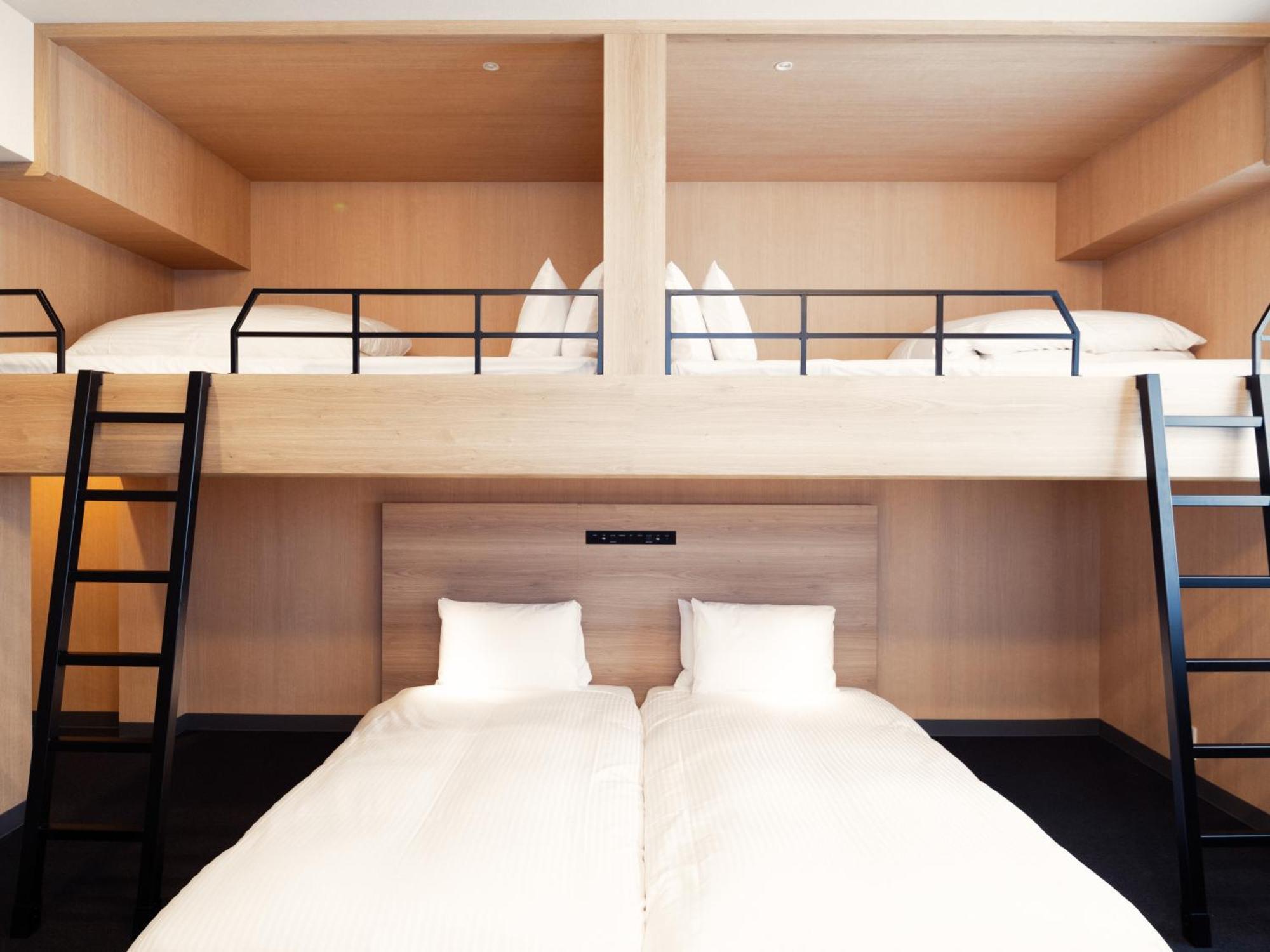 Apartamento con cama elevada
