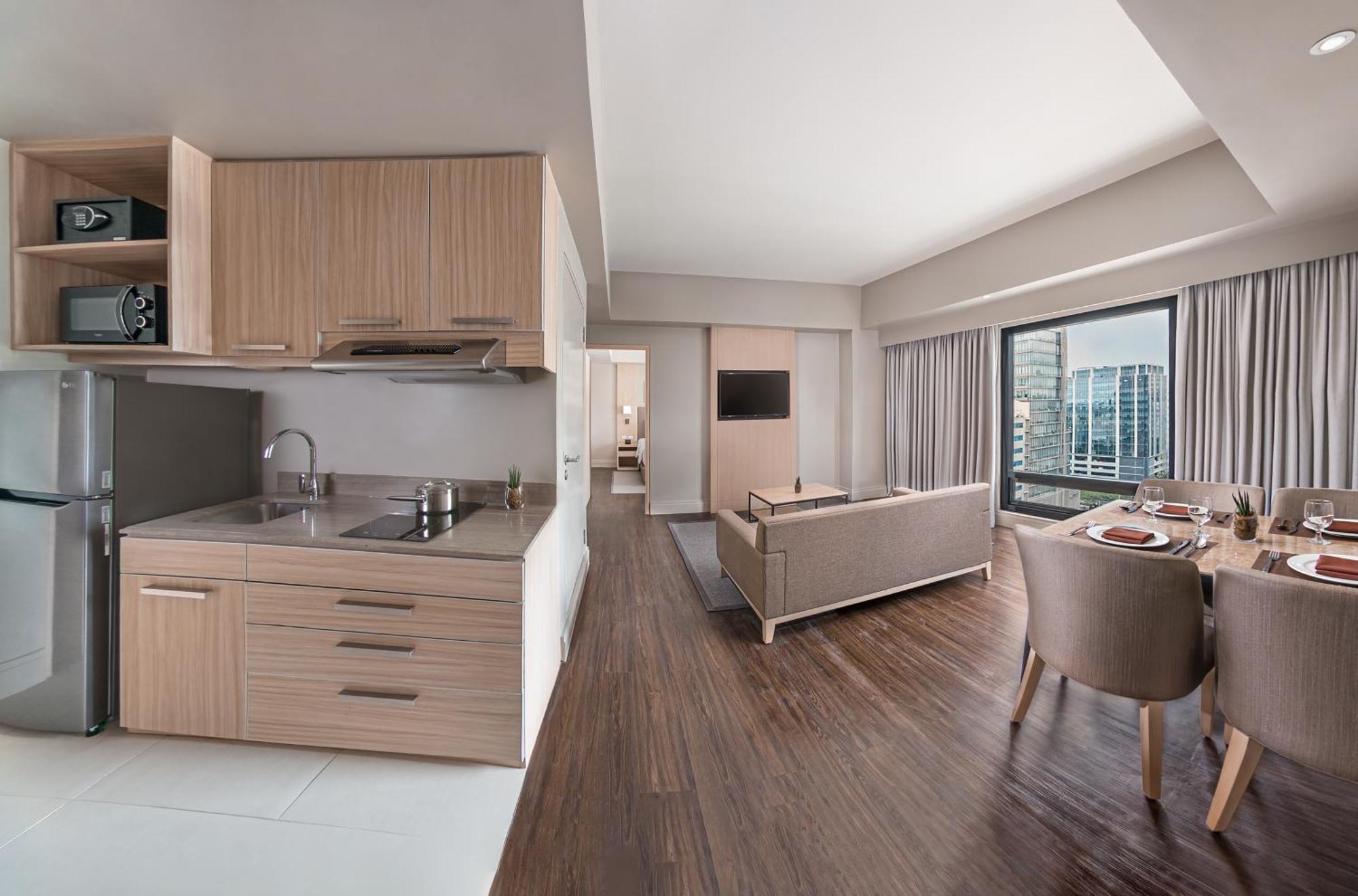 1 King Bed One-Bedroom Kitchenette Living Area