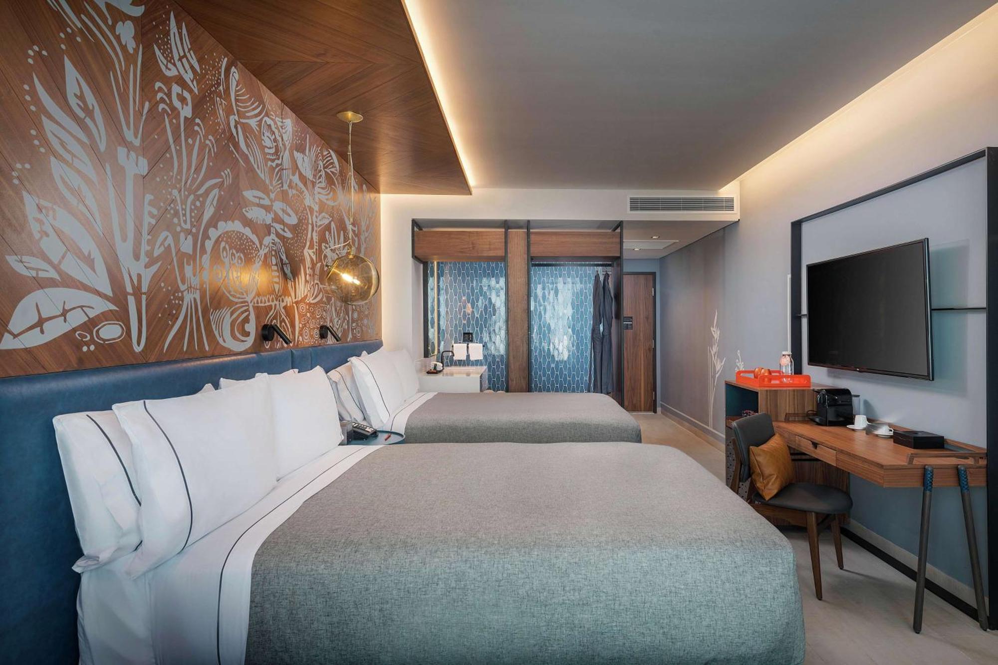 Premium Queen Room with Two Queen Beds and Sunset Bay View