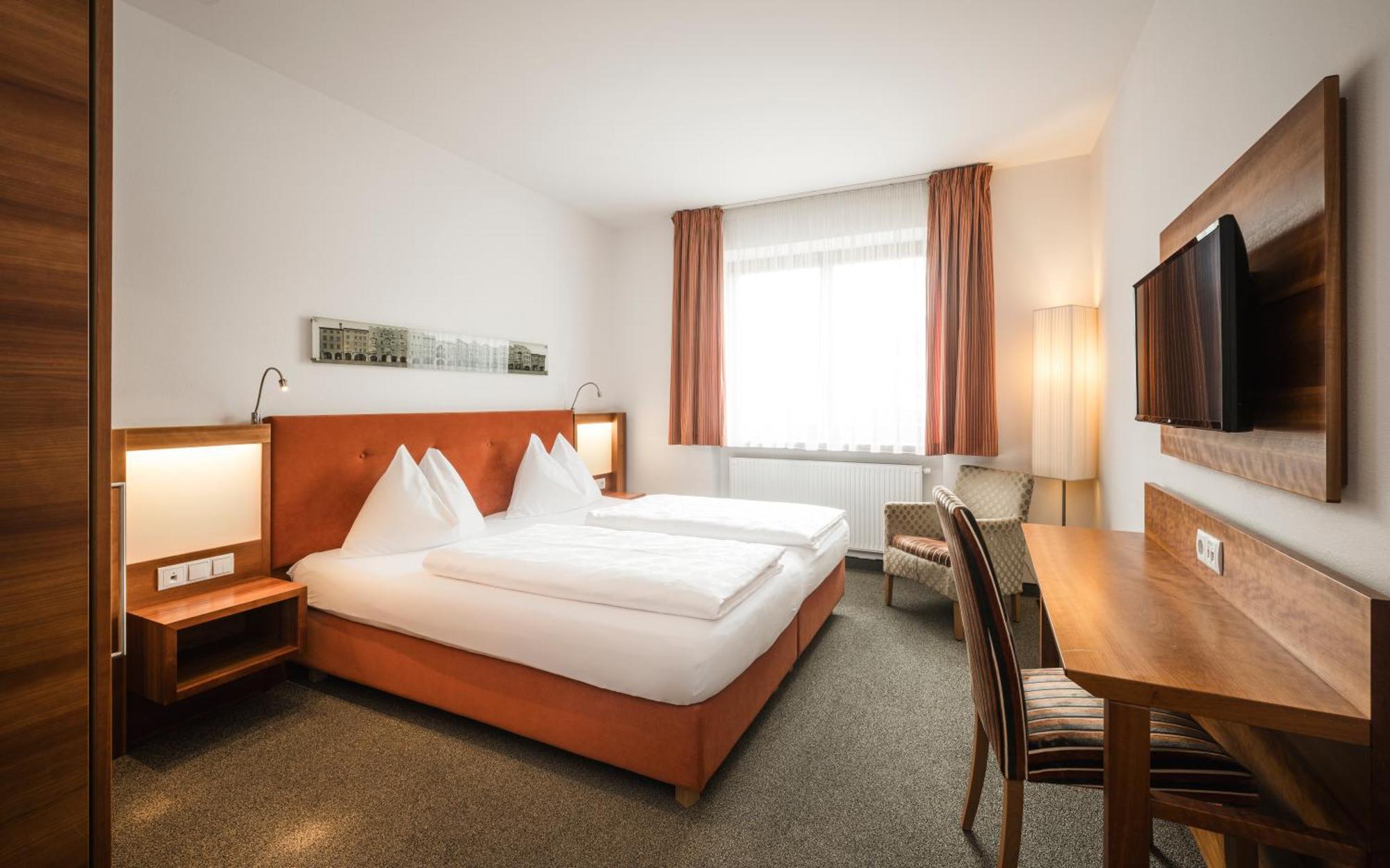 Doppel- oder Zweibettzimmer
