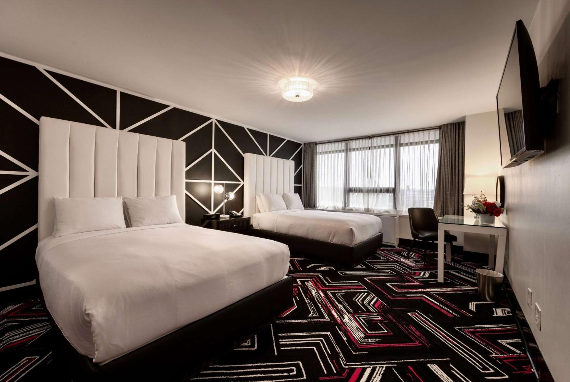 Double Room Mobility or Hearing Access Two Double Beds andTub Grab Bars Non-Smoking