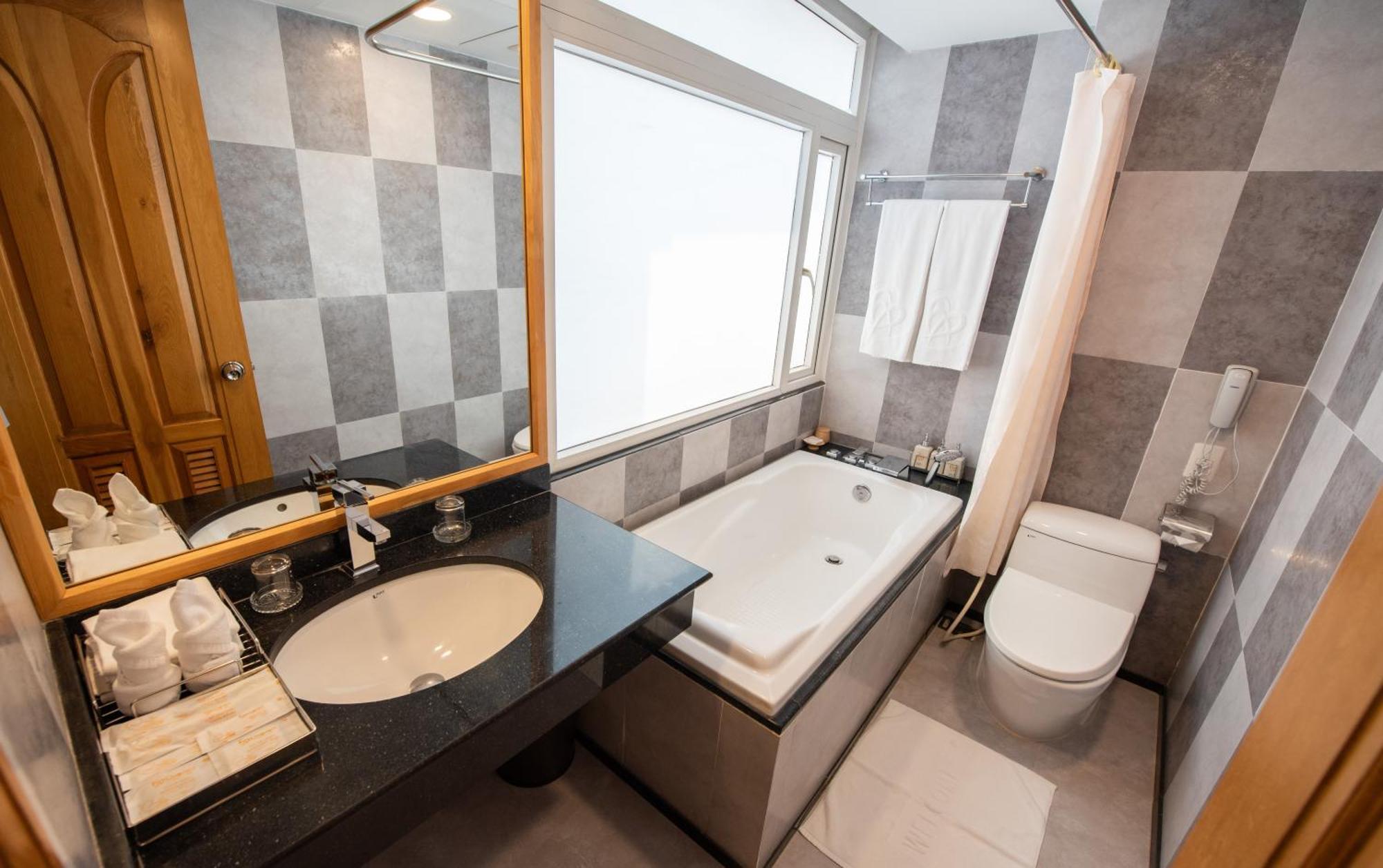 Chambre Deluxe Double ou Lits Jumeaux