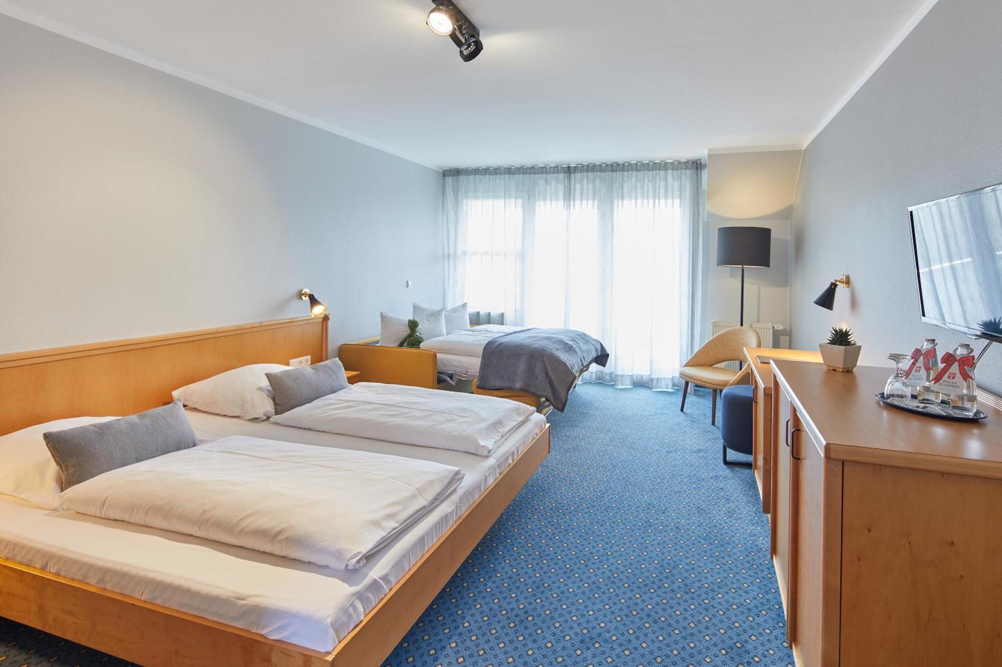 Familienzimmer (2 Erwachsene + 2 Kinder)
