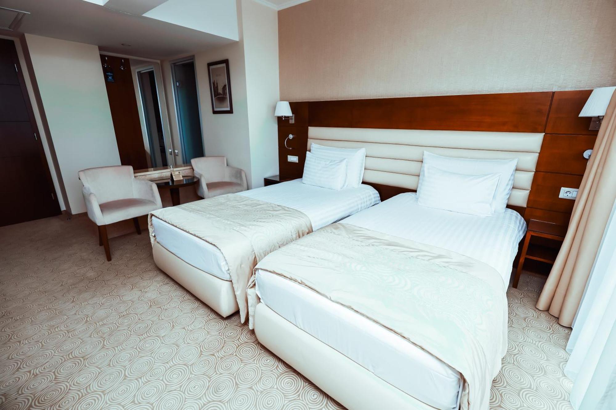 Camera Doppia con Letti Singoli