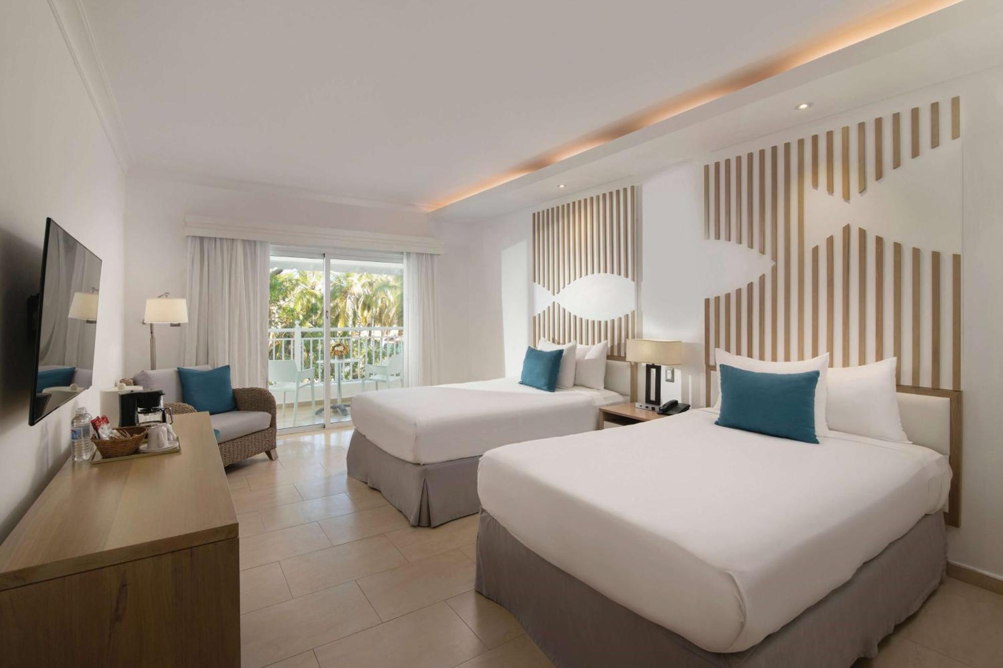 Premium Room with Two Double Beds and Garden View