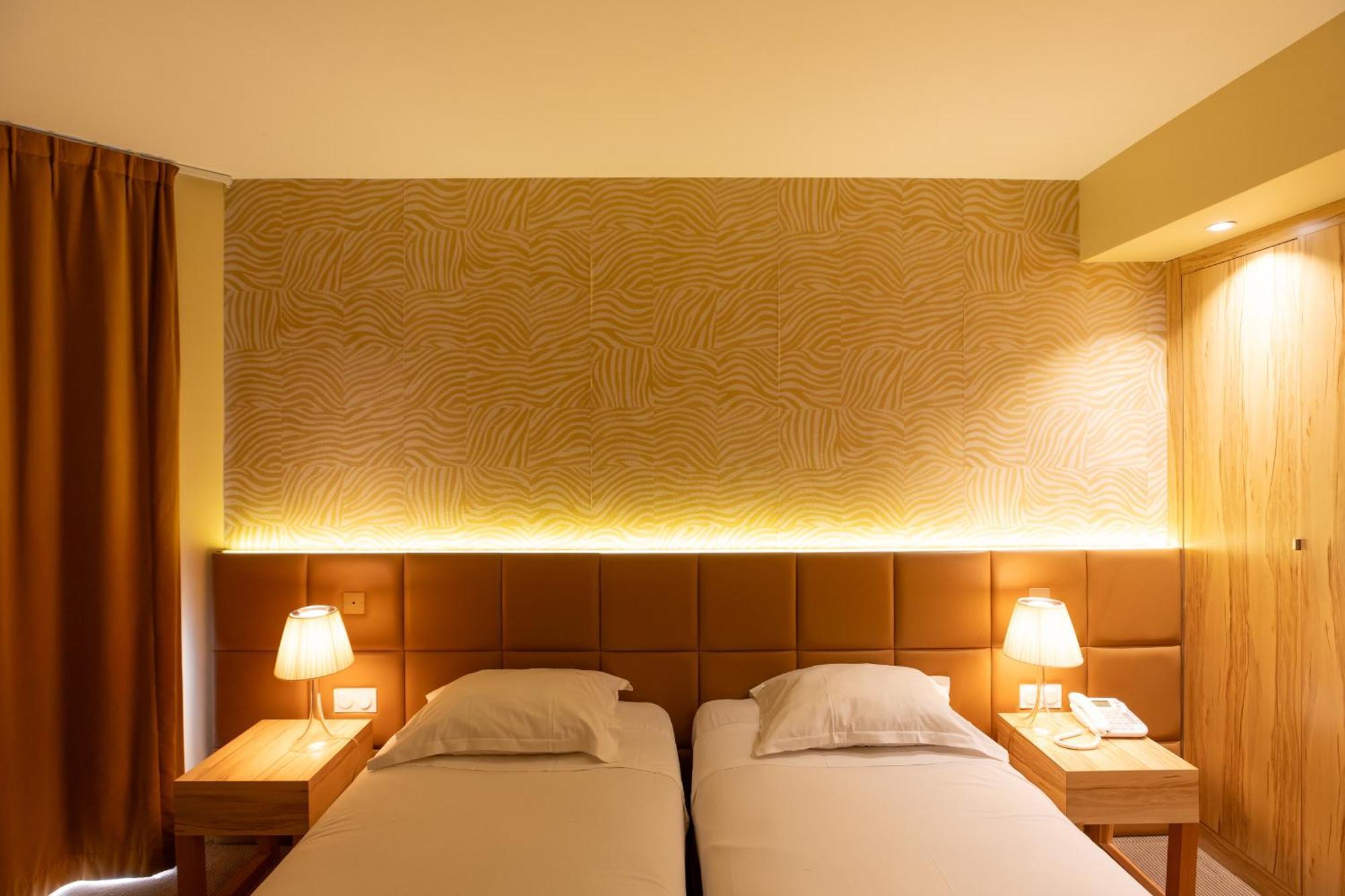 Superior Quadruple Room One King Two Single Beds Private Patio,1627201486:JPEG