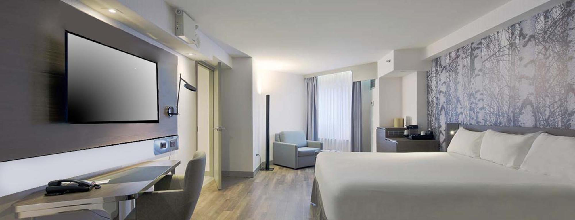 Studio Lit King-Size pour Personnes à Mobilité Réduite avec Douche Accessible en Fauteuil Roulant
