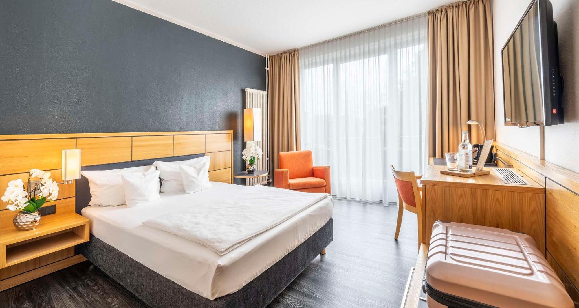 Comfort Zimmer mit Queensize-Bett und Balkon
