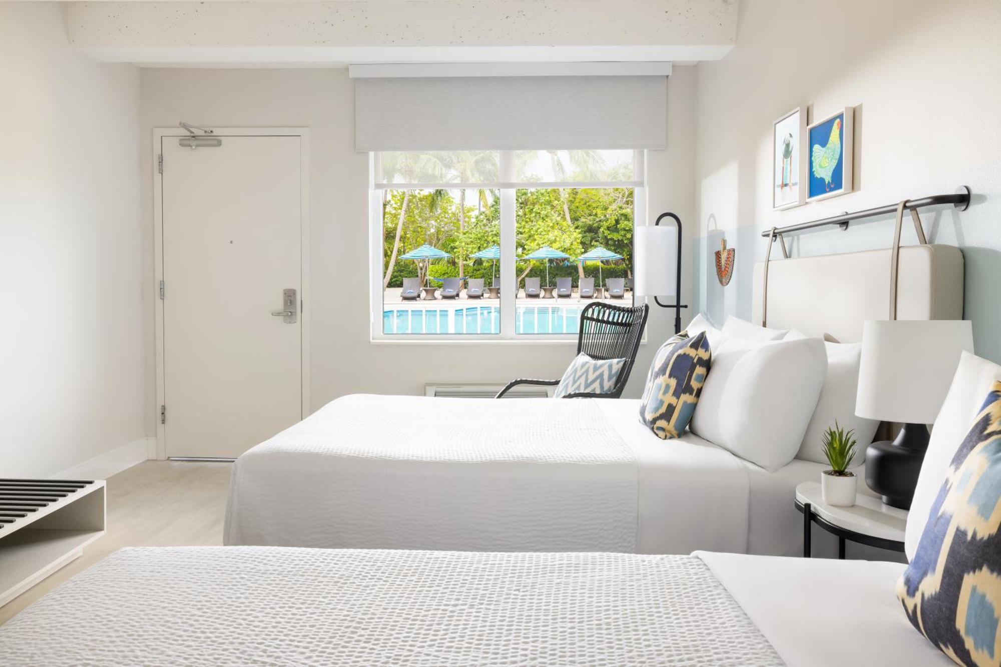 Pool View Two Queen Beds Hearing Accessible