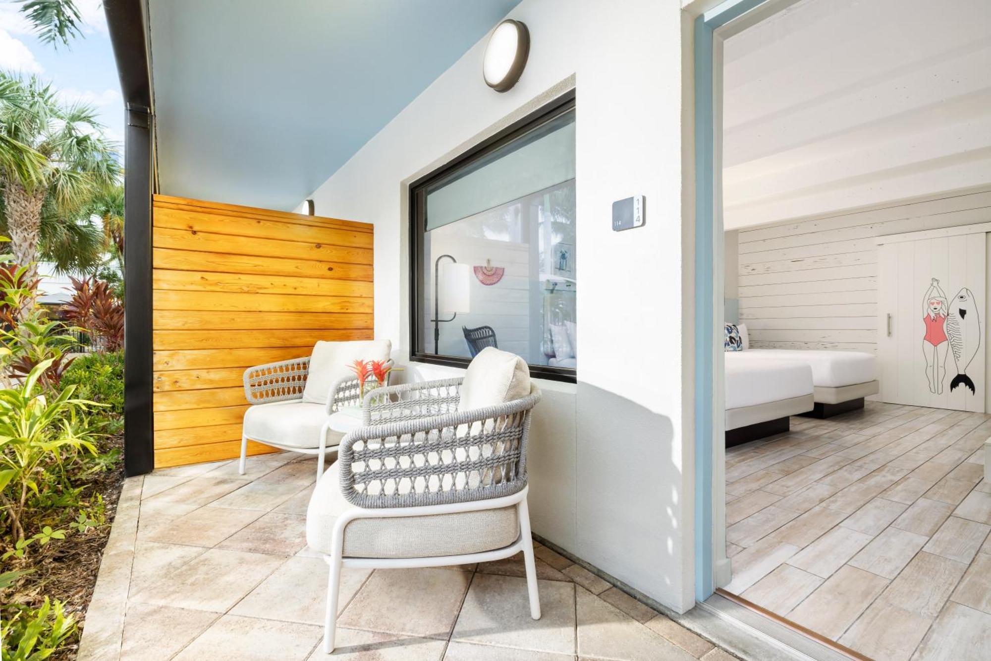 Pool View Two Queen Beds Hearing Accessible