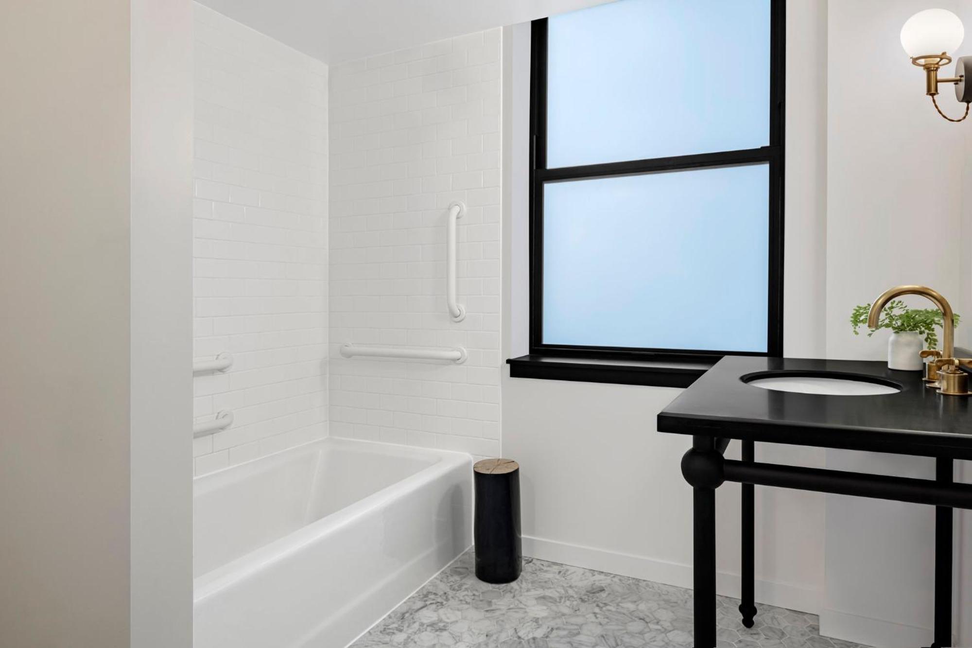 Essential King Room Mobility Accessible Tub Roll Shower