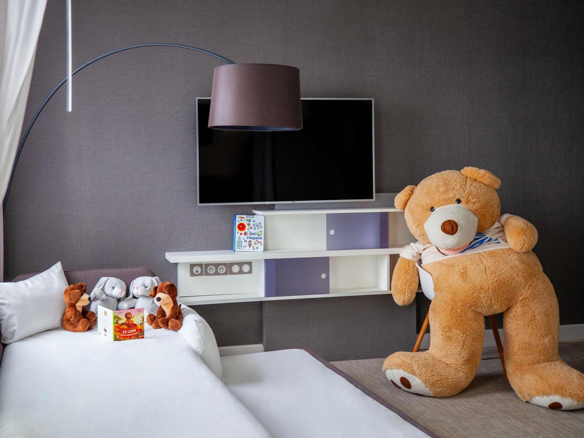 Suite Superior con 1 cama doble y 2 individuales