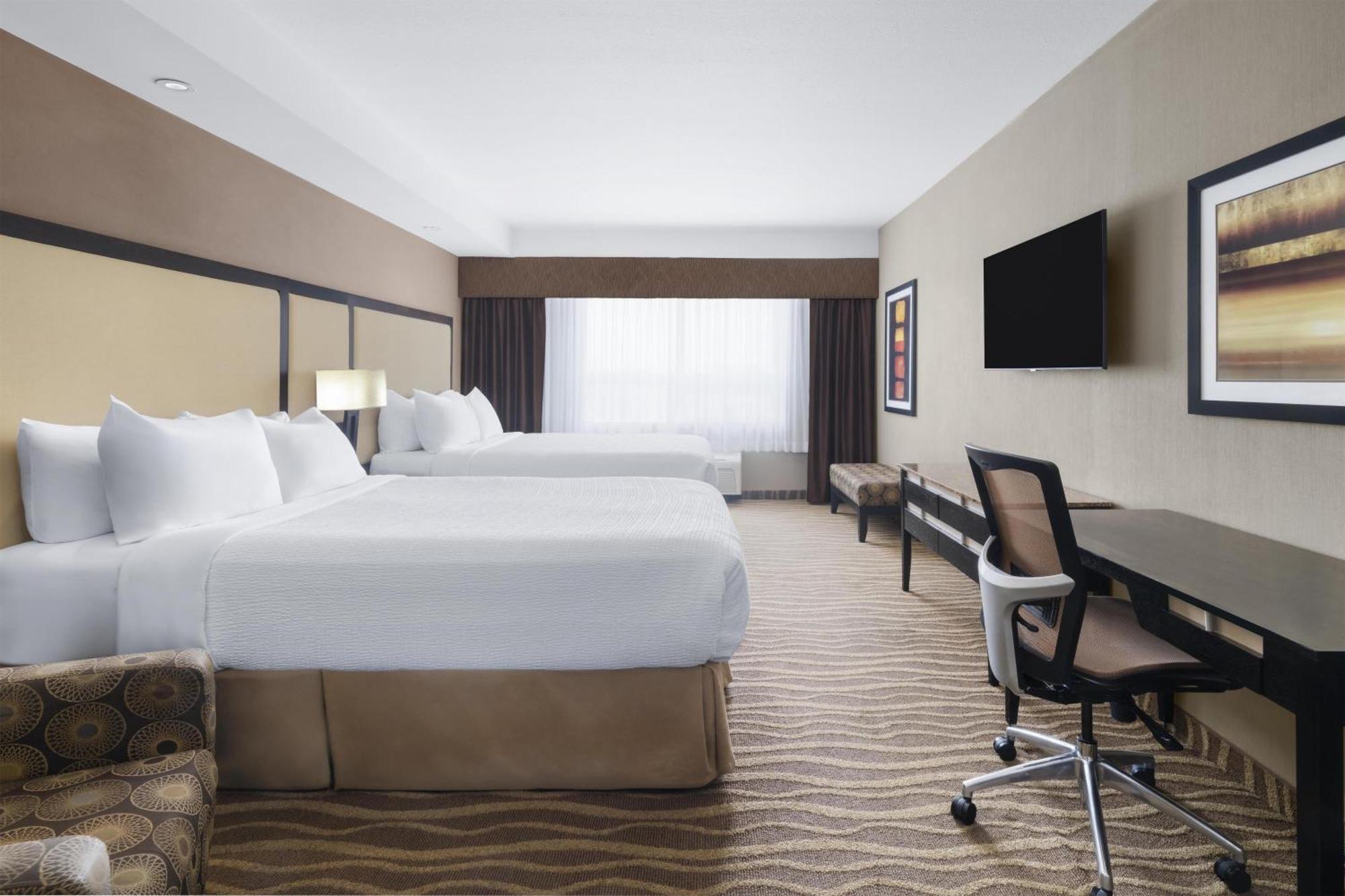 Queen Room Two Queen Beds Roll Shower Disability Access or Non-Smoking