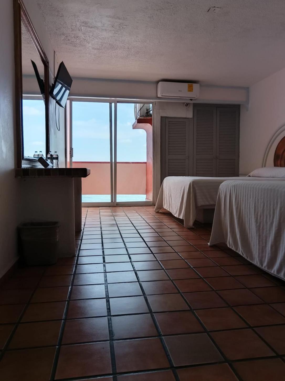 Habitación Cuádruple con vistas al mar