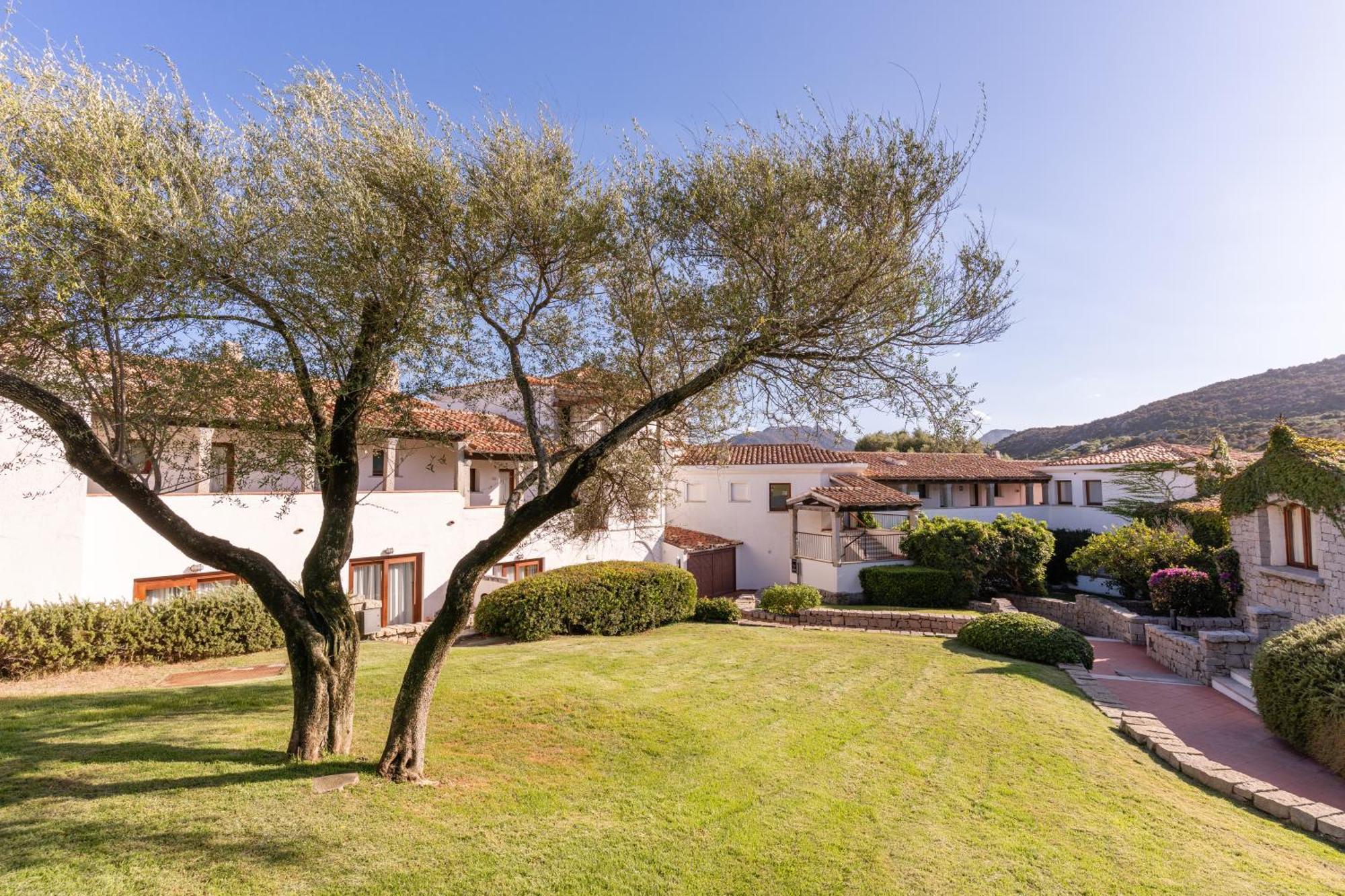Camera Tripla Classic con Vista Giardino