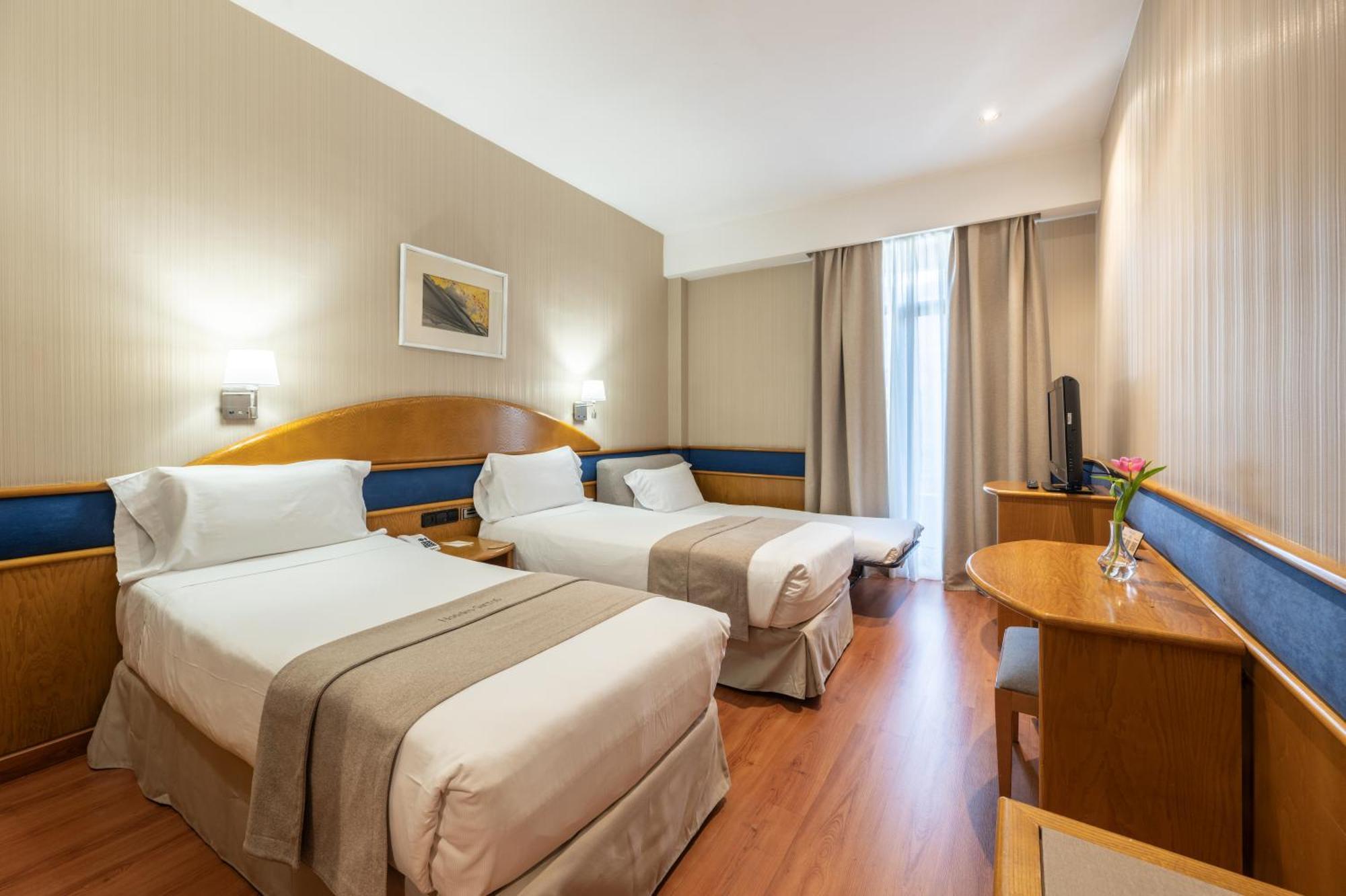 Triple Room (2 Adults + 1 Child)