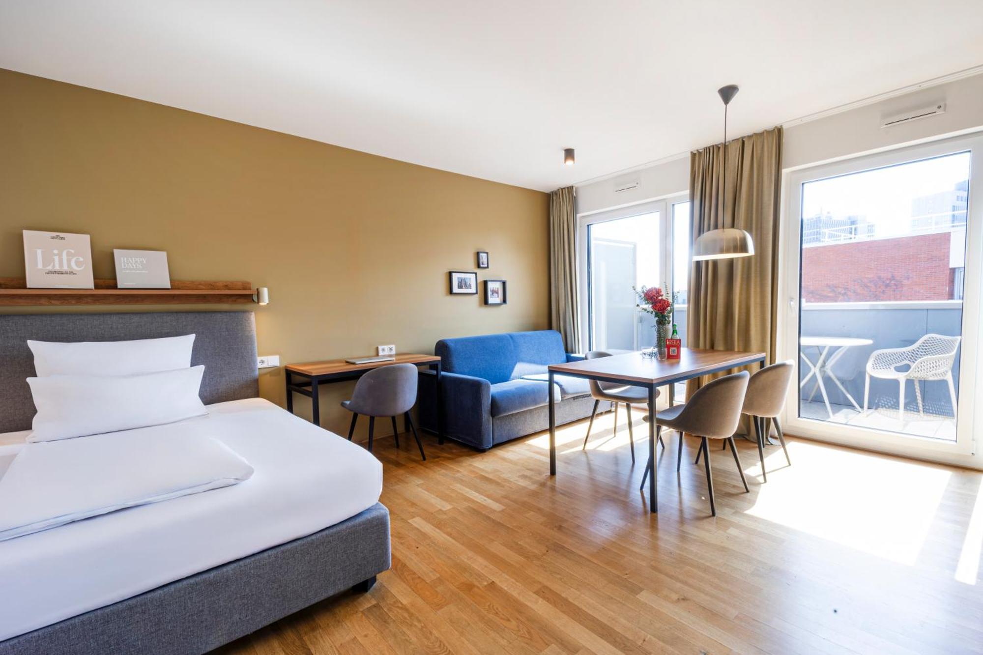 Apartment M mit Kingsize-Bett und Terrasse