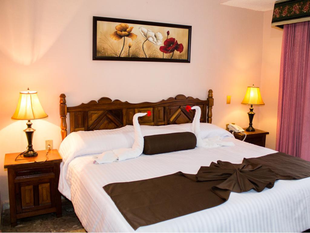 Habitación con cama extragrande.