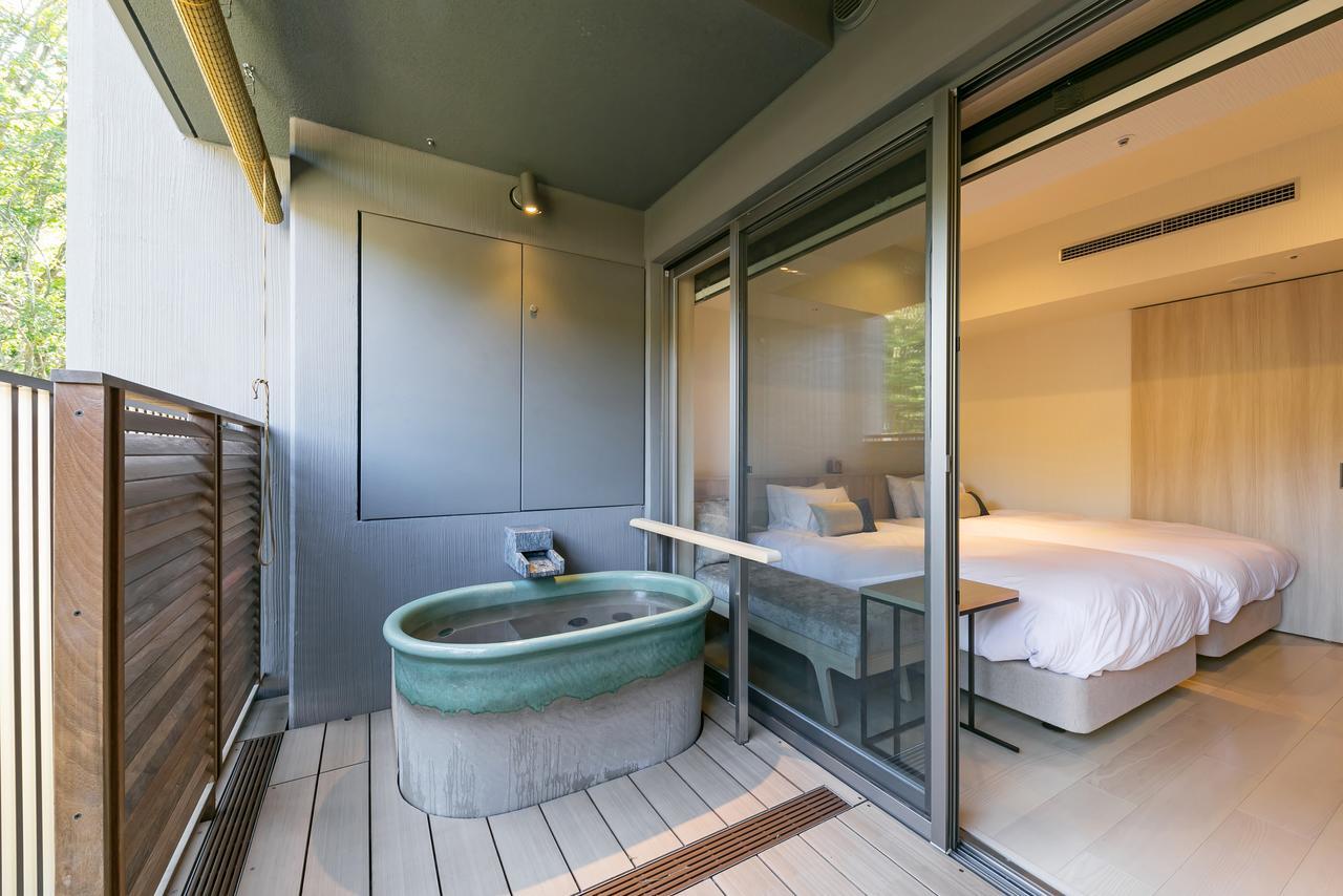 Chambre Lits Jumeaux Décontractée avec Baignoire en Plein Air