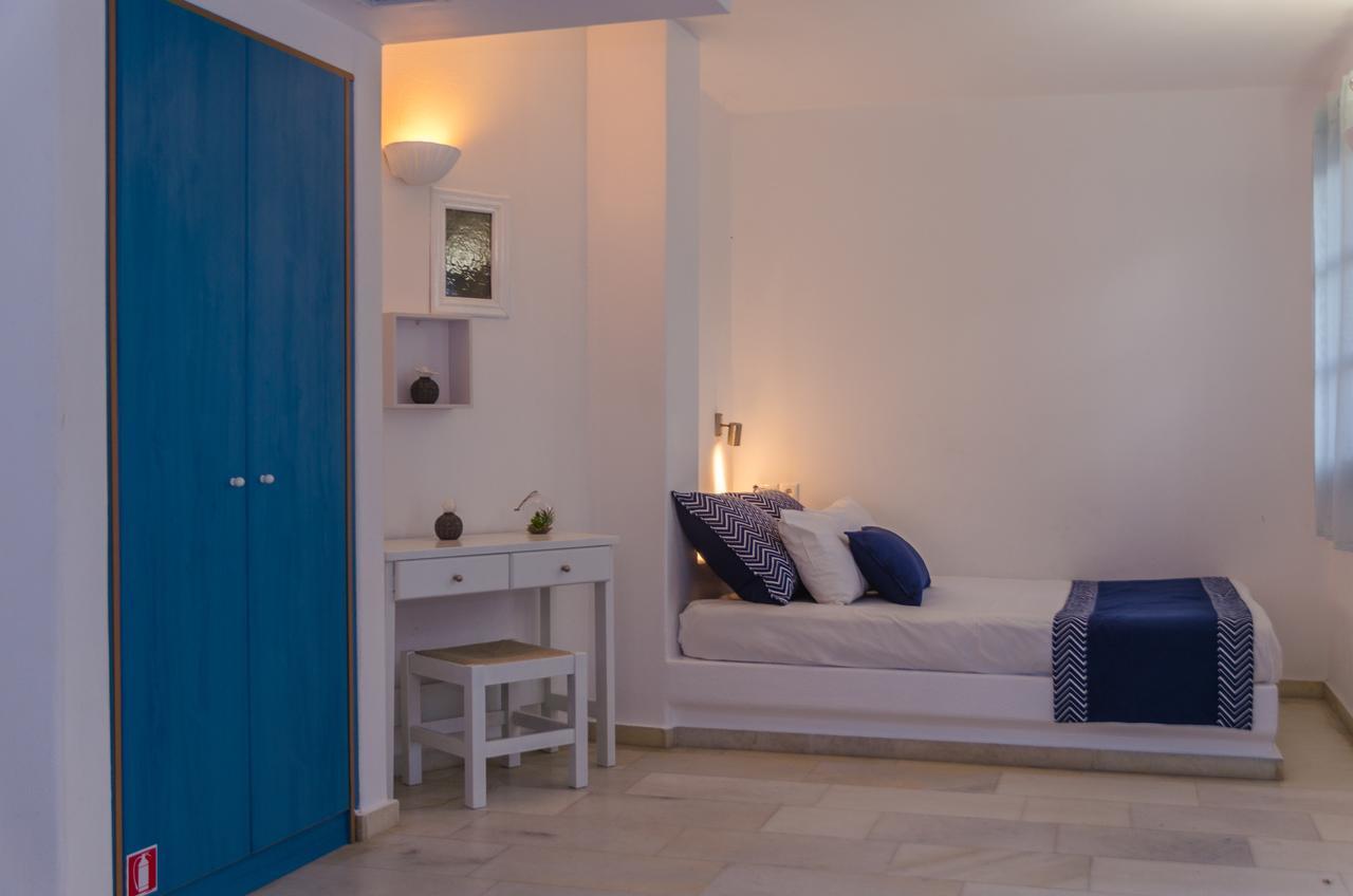 Chambre Triple - Vue sur la Piscine