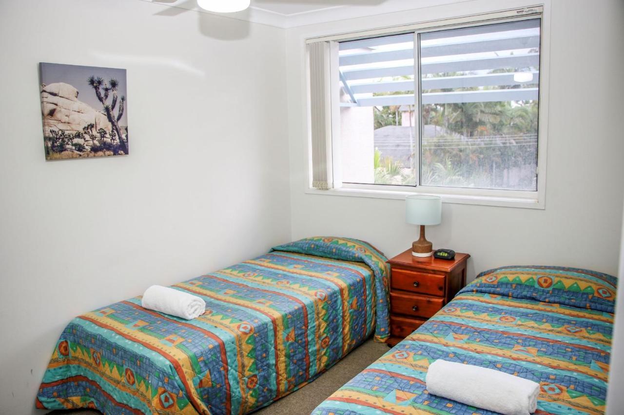 Three-Bedroom Pool View Apartment Balcony