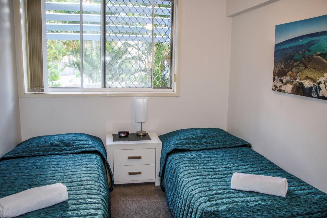 Three-Bedroom Pool View Apartment Balcony