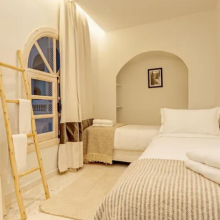 Riad K-White-3