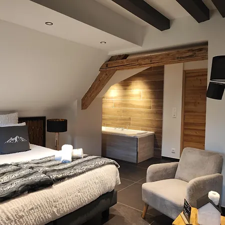 Géraniums Et Neige Fraîche, maison comtoise avec suites appartements de prestige, chambre tout confort, certaines avec spa et sauna privatifs au cœur du Jura à Métabief dans le Haut-Doubs-3
