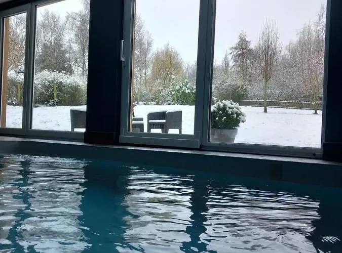 Chambre avec spa, piscine et sauna privatif Louches