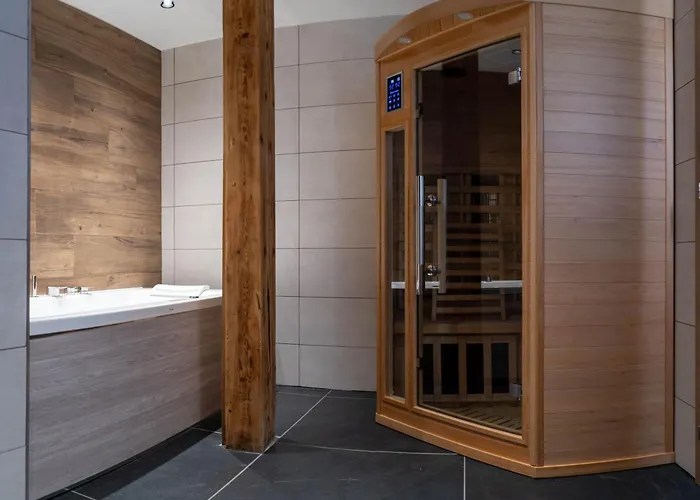 Géraniums Et Neige Fraîche, Maison d'Hôtes avec balnéo massante et sauna privatifs dans certaines suites haut standing